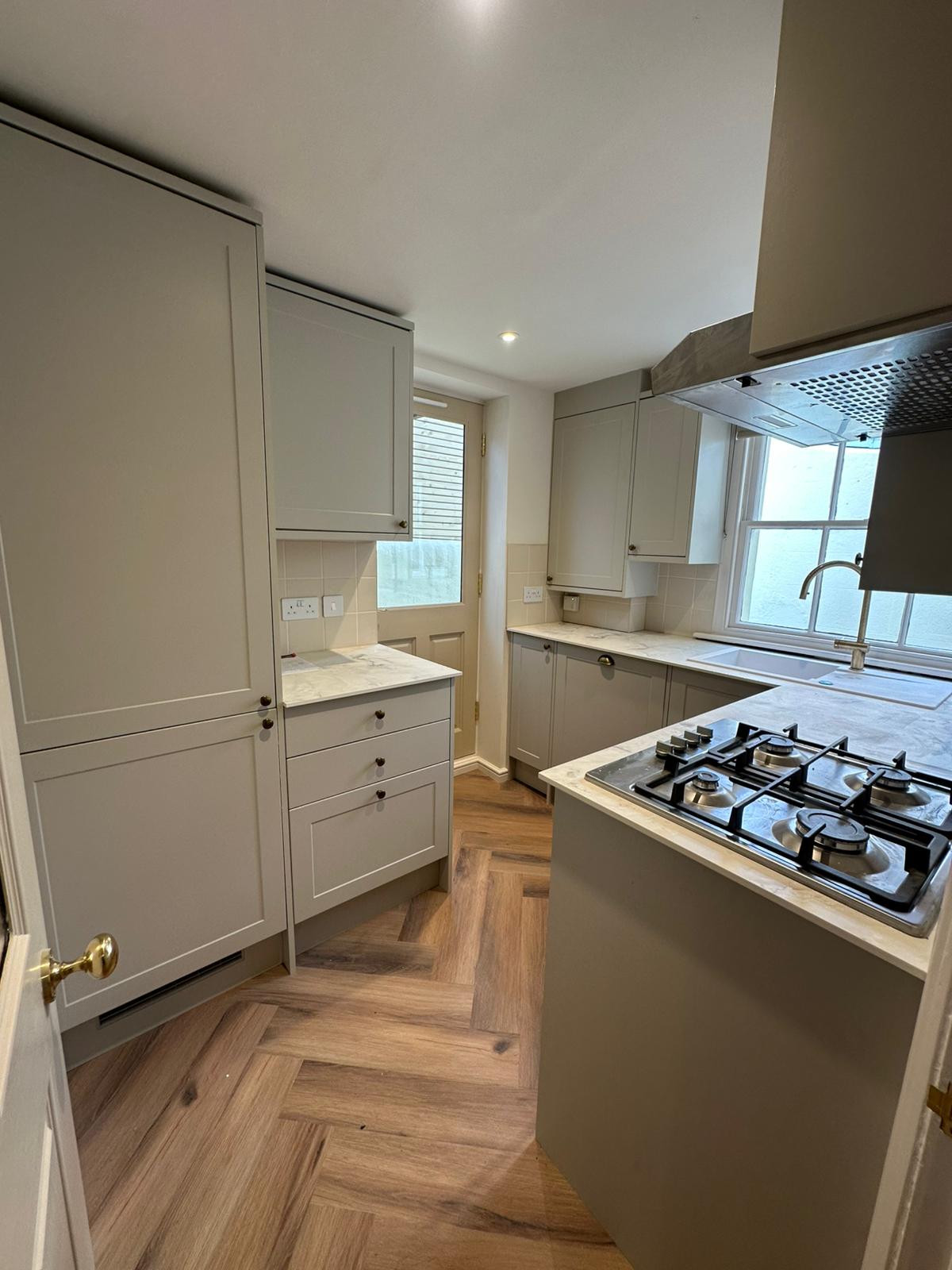 Completed basement renovation and kitchen project in Hova Villas