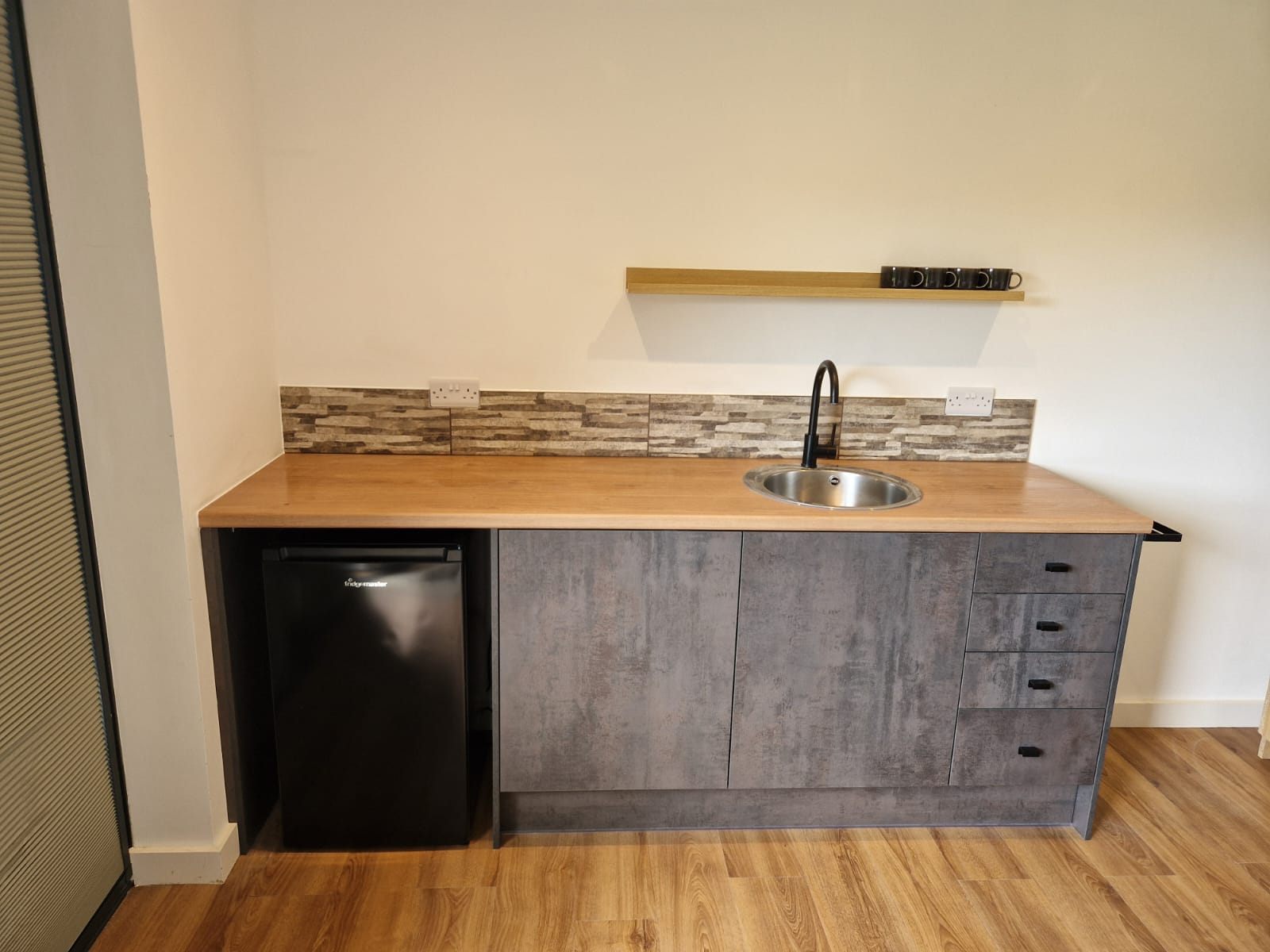 Completed kitchenette and laundry room project in Hassocks