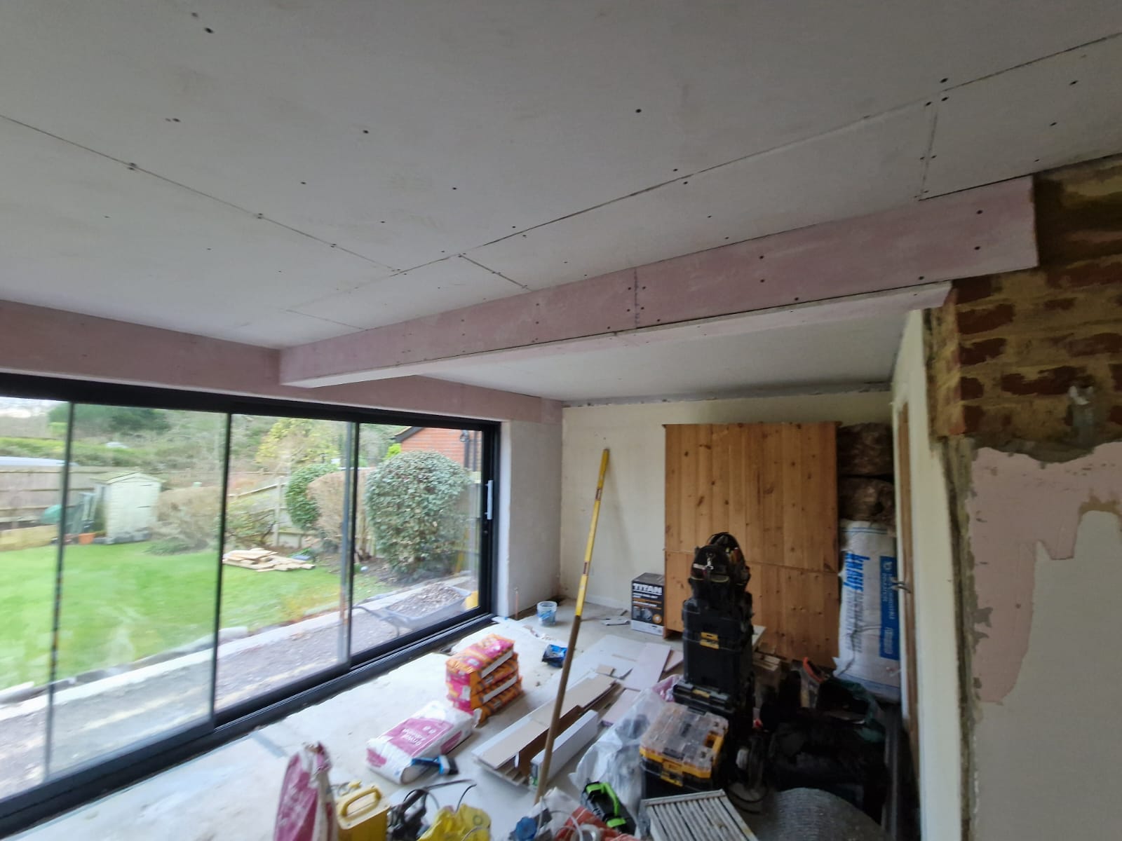 Patio and internal wall project in progress in Chiddingfold