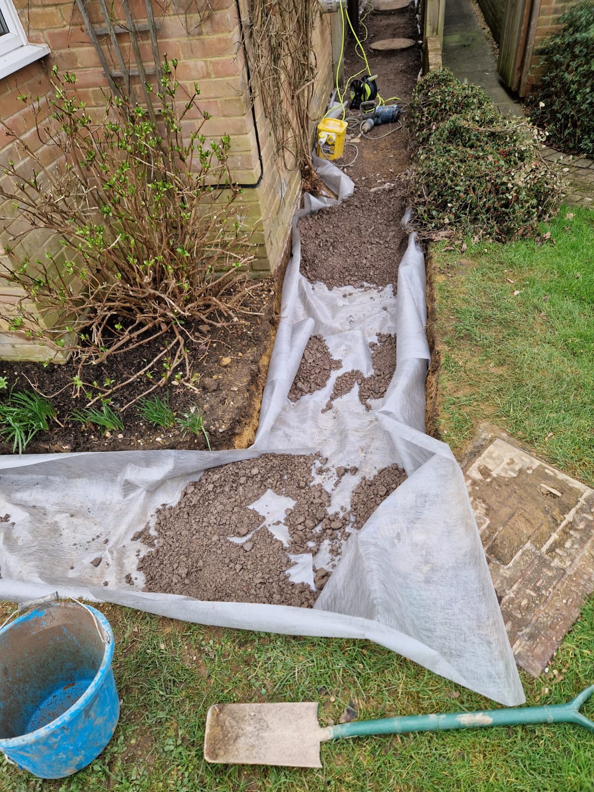 Patio and internal wall project in progress in Chiddingfold