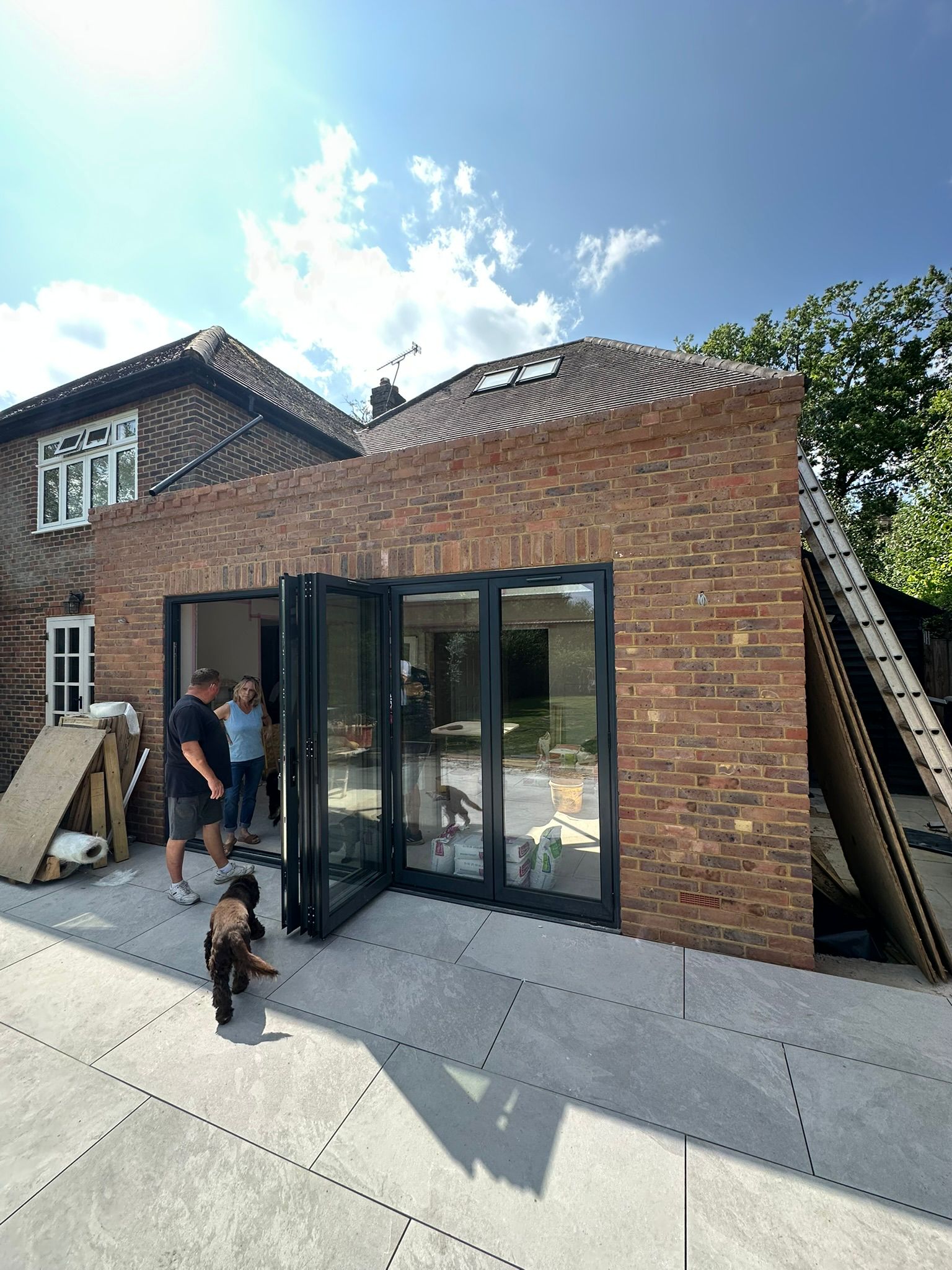 Rear extension and large front porch project in progress in Chiddingfold
