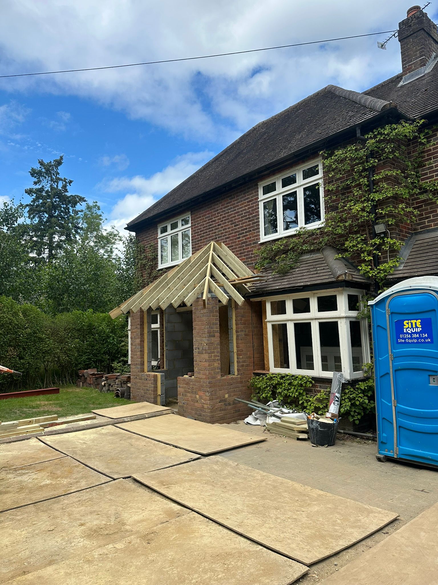 Rear extension and large front porch project in progress in Chiddingfold