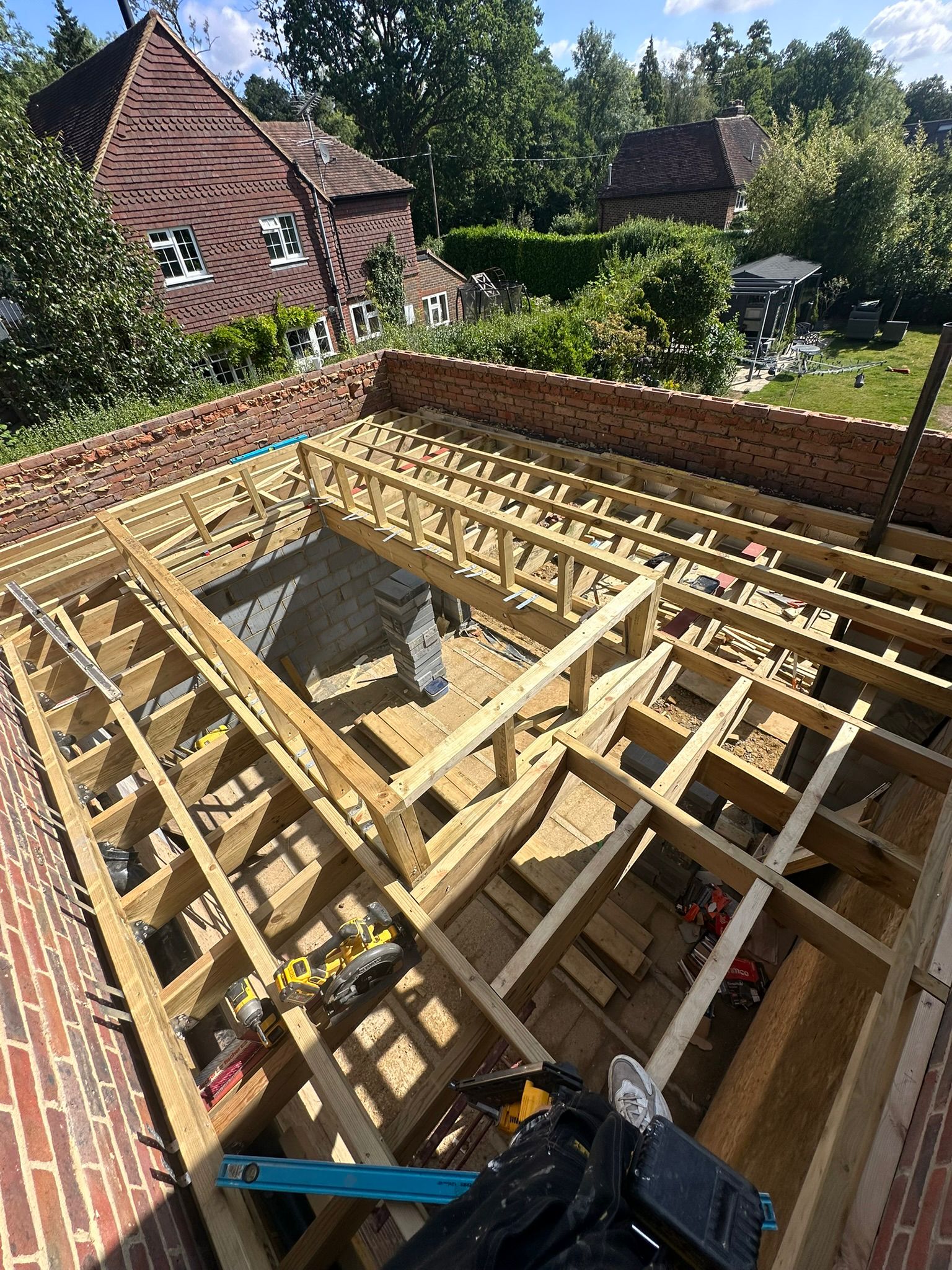 Rear extension and large front porch project in progress in Chiddingfold