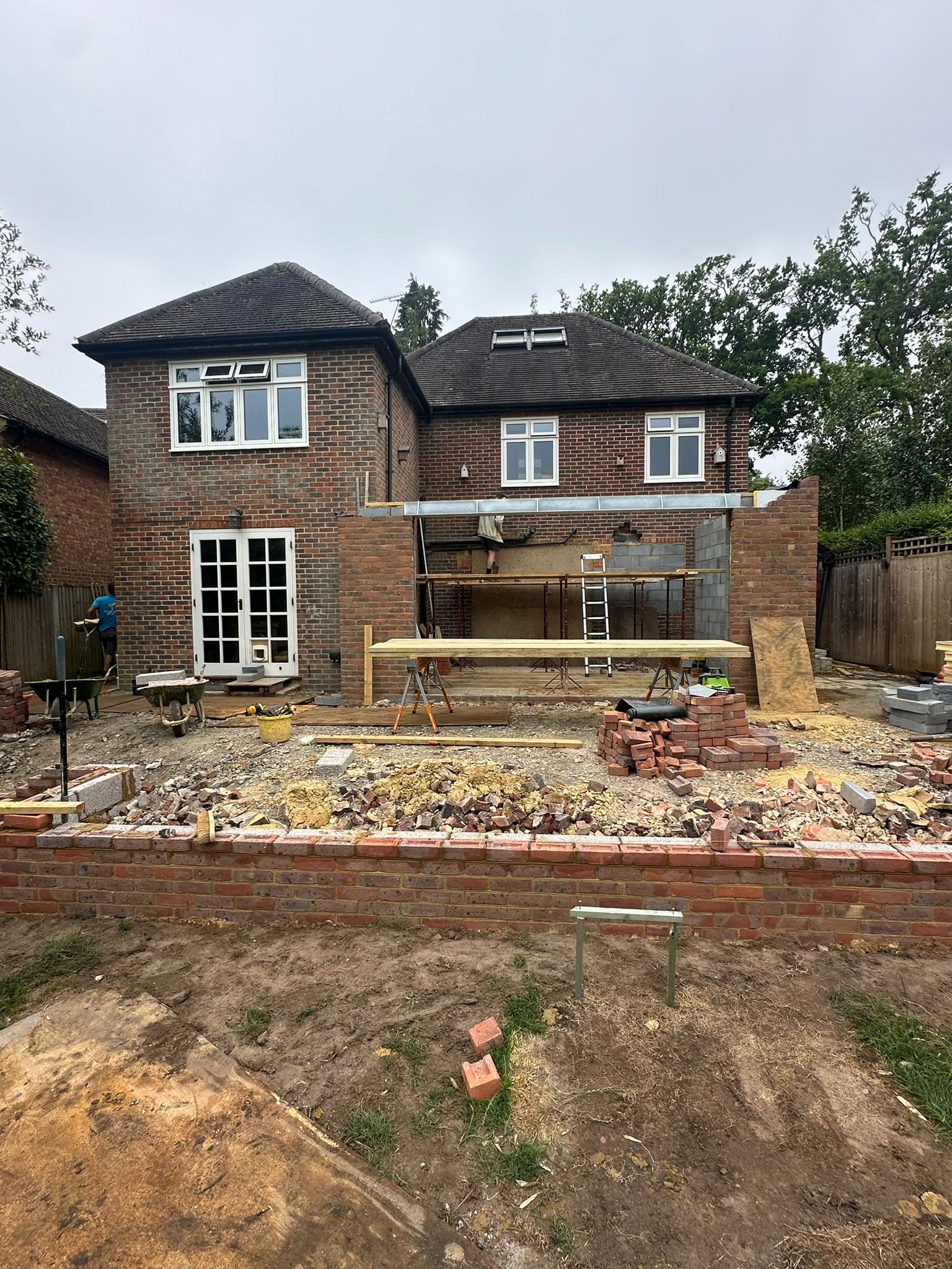 Rear extension and large front porch project in progress in Chiddingfold