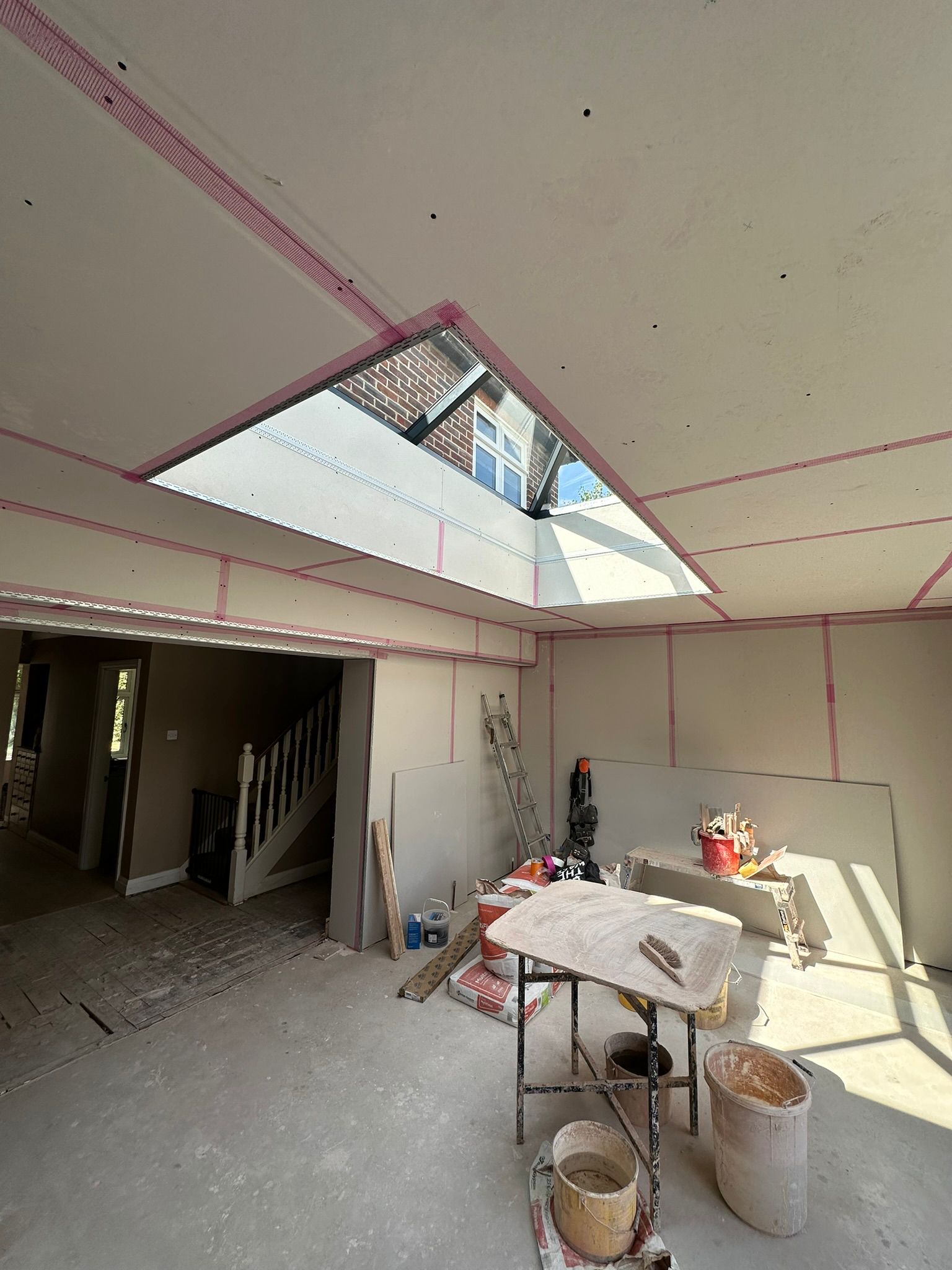 Rear extension and large front porch project in progress in Chiddingfold
