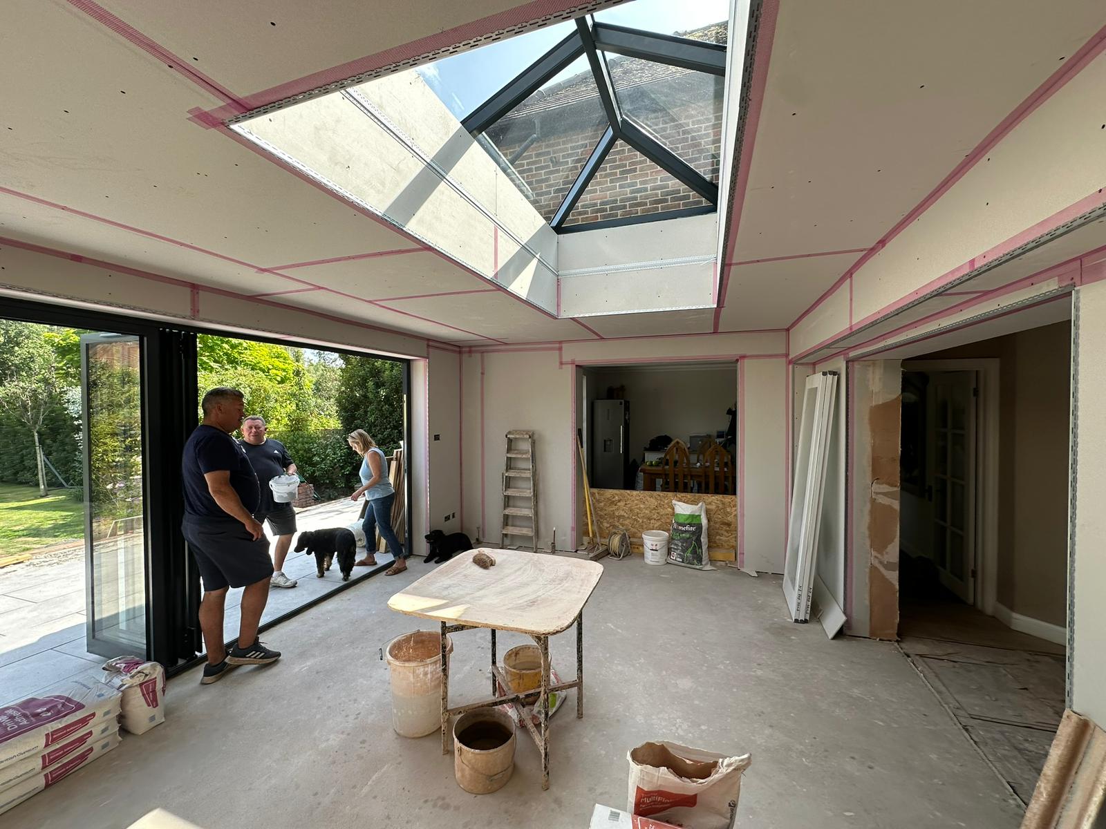 Rear extension and large front porch project in progress in Chiddingfold