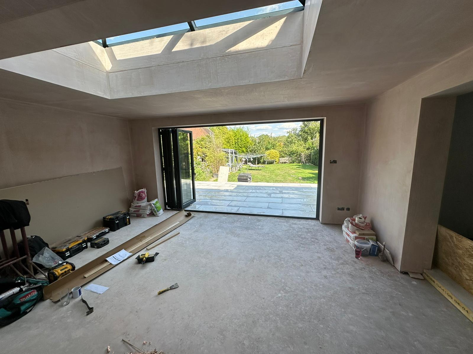 Rear extension and large front porch project in progress in Chiddingfold
