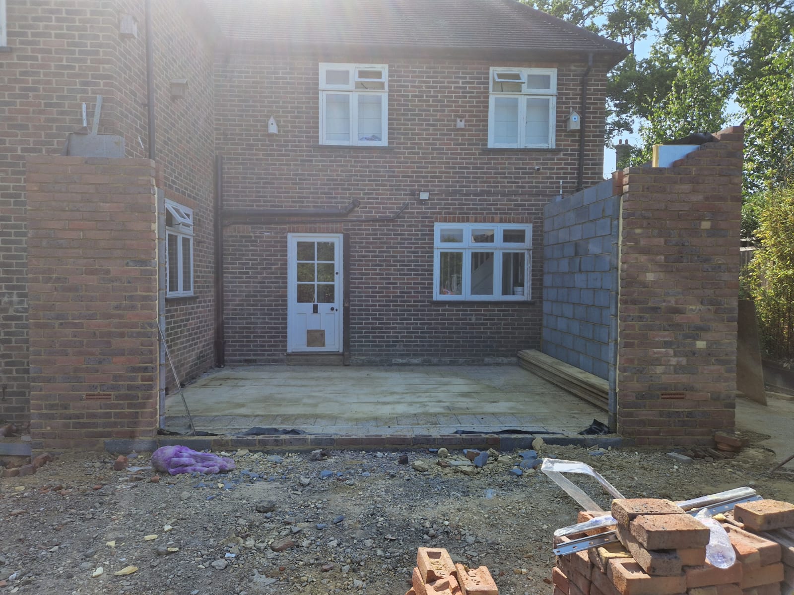 Rear extension and large front porch project in progress in Chiddingfold